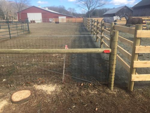 4-board horse fence with woven wire paddock fencing